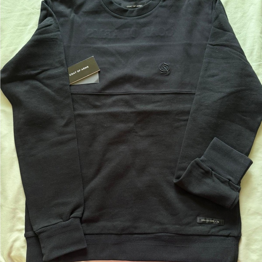 Classic Black Crewneck Sweater with Ribbed Cuffs
